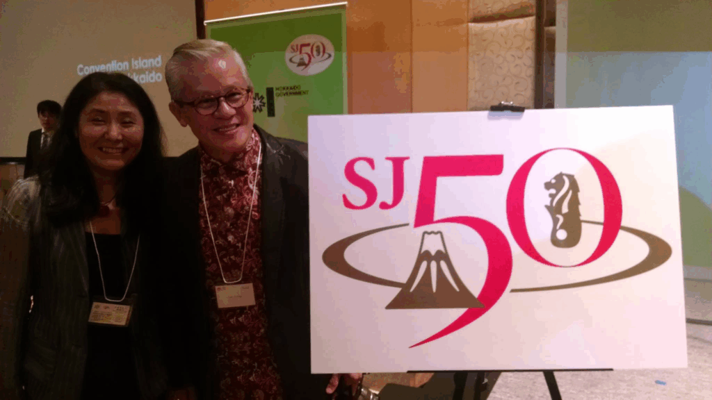 Visit Japan Ambassador George Lim and JCC Director, Misako Ito with SJ50 Logo